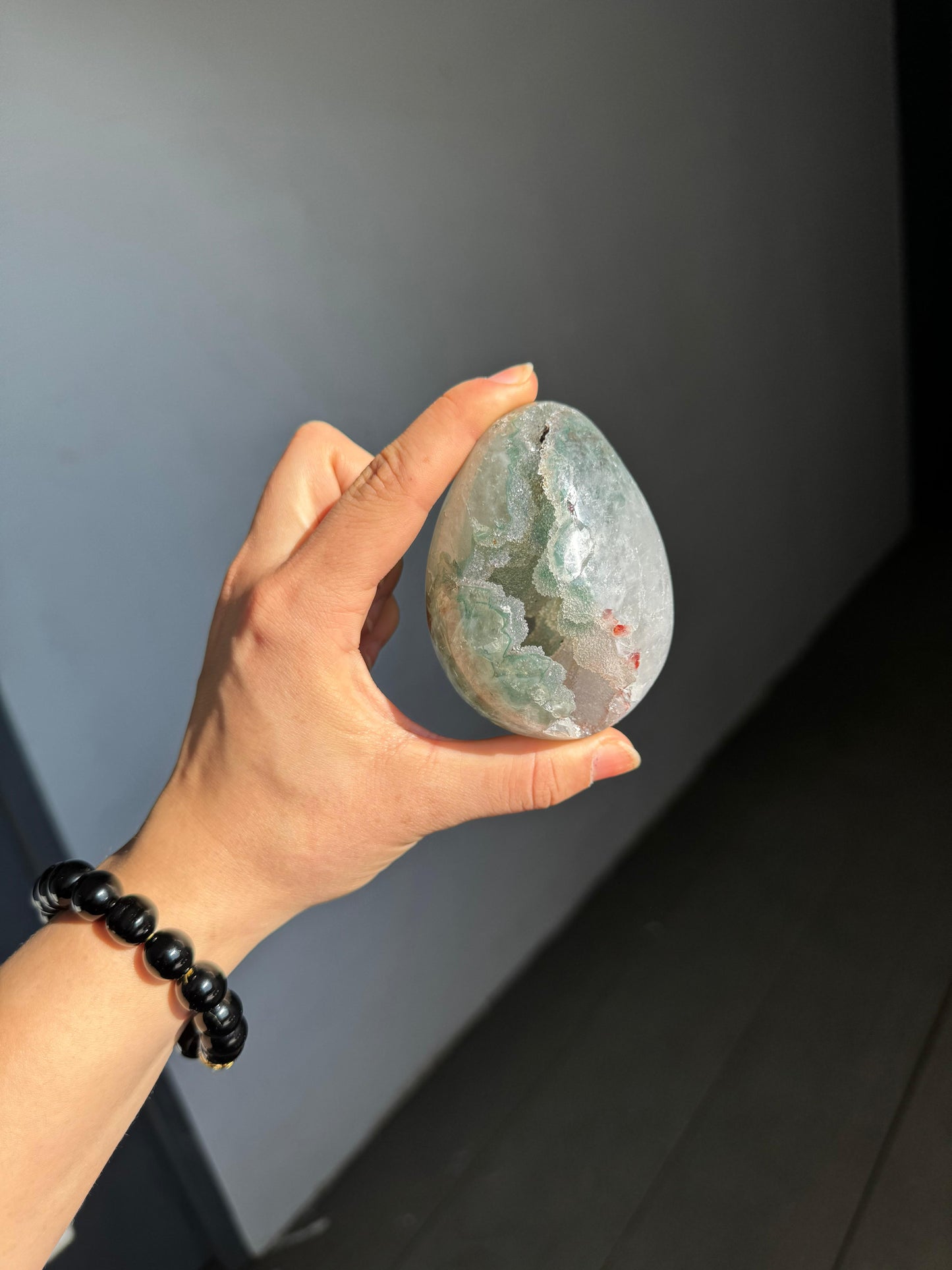 Green rainbow quartz egg