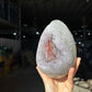 Big quartz hematite egg