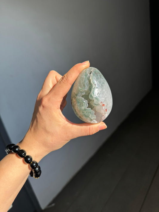 Green rainbow quartz egg