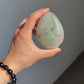 Green rainbow quartz egg
